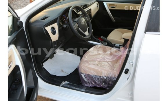 Buy Import Toyota Corolla White Car in Import - Dubai in Al Jazirah State Buy Import Toyota Corolla White Car in Import - Dubai in Al Jazirah State