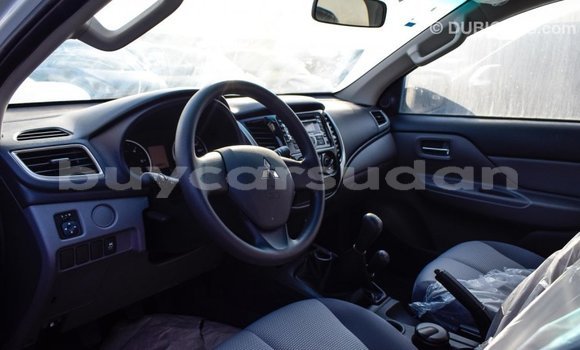 Buy Import Mitsubishi L200 White Car in Import - Dubai in Al Jazirah State Buy Import Mitsubishi L200 White Car in Import - Dubai in Al Jazirah State