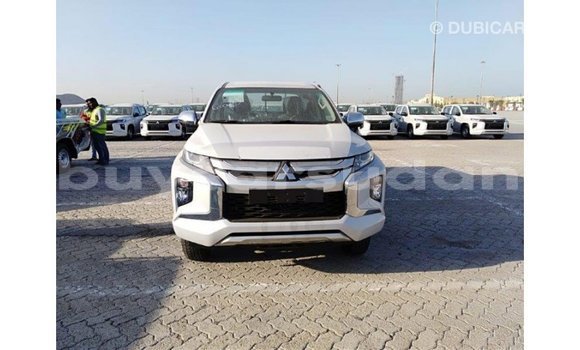 Buy Import Mitsubishi L200 White Car in Import - Dubai in Al Jazirah State Buy Import Mitsubishi L200 White Car in Import - Dubai in Al Jazirah State