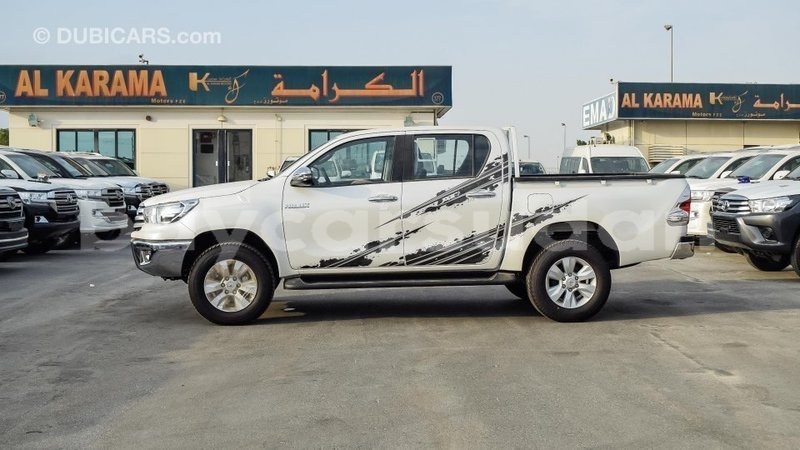 Big with watermark toyota hilux al jazirah state import dubai 1929