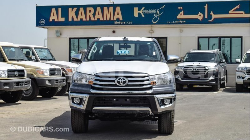 Big with watermark toyota hilux al jazirah state import dubai 1932