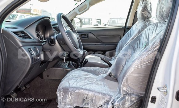 Buy Import Mitsubishi L200 White Car in Import - Dubai in Al Jazirah State Buy Import Mitsubishi L200 White Car in Import - Dubai in Al Jazirah State