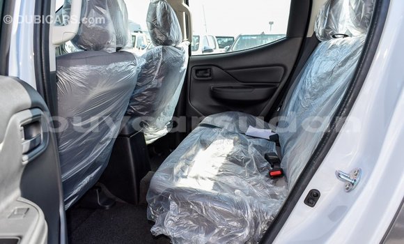 Buy Import Mitsubishi L200 White Car in Import - Dubai in Al Jazirah State Buy Import Mitsubishi L200 White Car in Import - Dubai in Al Jazirah State