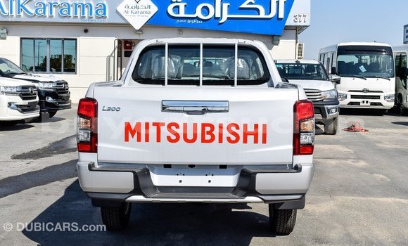 Buy Import Mitsubishi L200 White Car in Import - Dubai in Al Jazirah State Buy Import Mitsubishi L200 White Car in Import - Dubai in Al Jazirah State