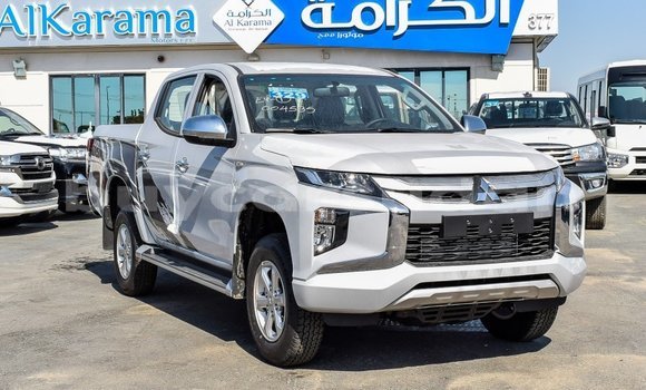 Buy Import Mitsubishi L200 White Car in Import - Dubai in Al Jazirah State Buy Import Mitsubishi L200 White Car in Import - Dubai in Al Jazirah State