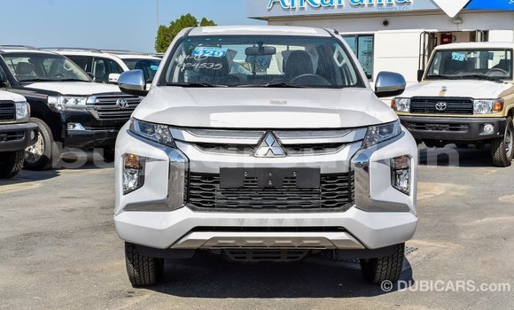 Buy Import Mitsubishi L200 White Car in Import - Dubai in Al Jazirah State Buy Import Mitsubishi L200 White Car in Import - Dubai in Al Jazirah State