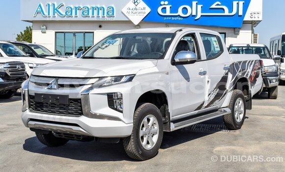Buy Import Mitsubishi L200 White Car in Import - Dubai in Al Jazirah State Buy Import Mitsubishi L200 White Car in Import - Dubai in Al Jazirah State