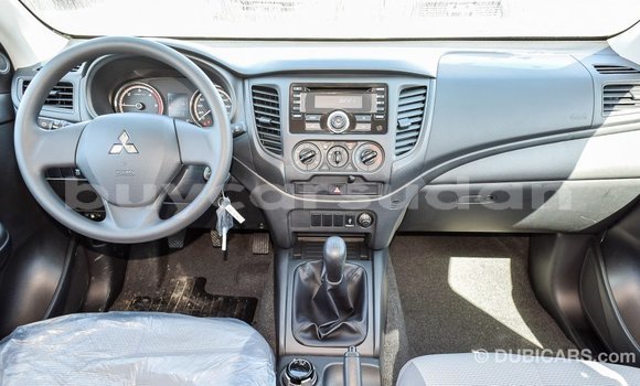 Buy Import Mitsubishi L200 White Car in Import - Dubai in Al Jazirah State Buy Import Mitsubishi L200 White Car in Import - Dubai in Al Jazirah State