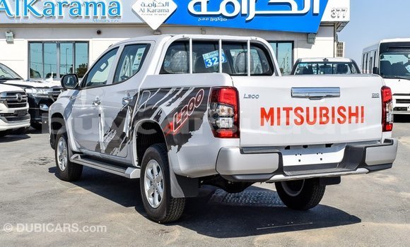 Buy Import Mitsubishi L200 White Car in Import - Dubai in Al Jazirah State Buy Import Mitsubishi L200 White Car in Import - Dubai in Al Jazirah State