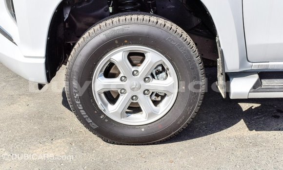 Buy Import Mitsubishi L200 White Car in Import - Dubai in Al Jazirah State Buy Import Mitsubishi L200 White Car in Import - Dubai in Al Jazirah State