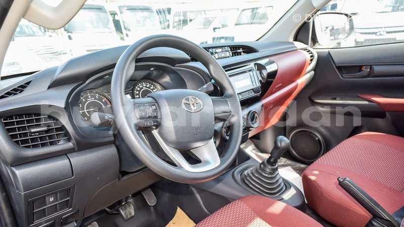 Big with watermark toyota hilux al jazirah state import dubai 1990