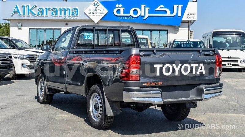 Big with watermark toyota hilux al jazirah state import dubai 1990