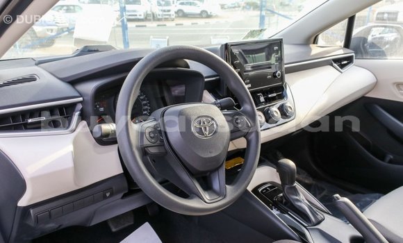 Buy Import Toyota Corolla White Car in Import - Dubai in Al Jazirah State Buy Import Toyota Corolla White Car in Import - Dubai in Al Jazirah State