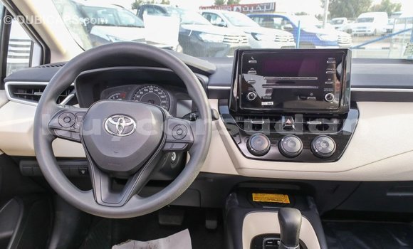 Buy Import Toyota Corolla White Car in Import - Dubai in Al Jazirah State Buy Import Toyota Corolla White Car in Import - Dubai in Al Jazirah State