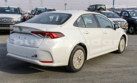 Buy Import Toyota Corolla White Car in Import - Dubai in Al Jazirah State Buy Import Toyota Corolla White Car in Import - Dubai in Al Jazirah State
