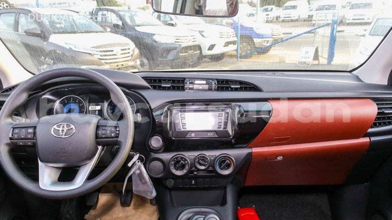 Big with watermark toyota hilux al jazirah state import dubai 2037