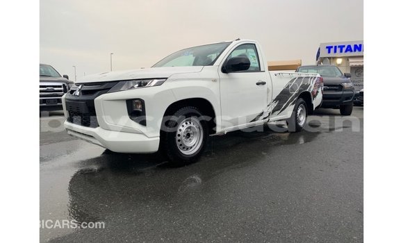 Buy Import Mitsubishi L200 White Car in Import - Dubai in Al Jazirah State Buy Import Mitsubishi L200 White Car in Import - Dubai in Al Jazirah State