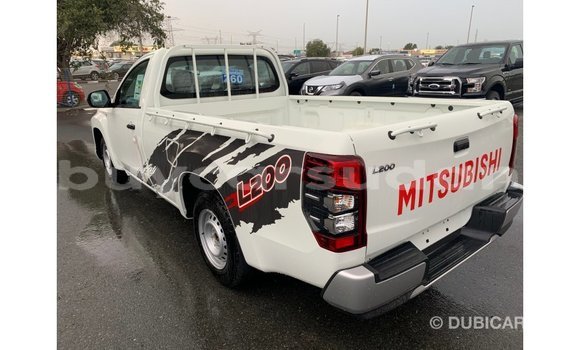 Buy Import Mitsubishi L200 White Car in Import - Dubai in Al Jazirah State Buy Import Mitsubishi L200 White Car in Import - Dubai in Al Jazirah State