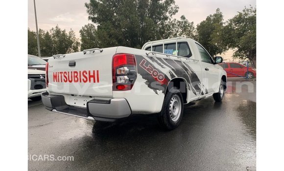 Buy Import Mitsubishi L200 White Car in Import - Dubai in Al Jazirah State Buy Import Mitsubishi L200 White Car in Import - Dubai in Al Jazirah State
