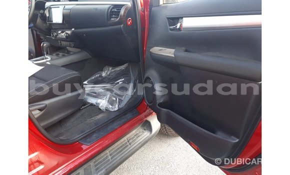 Buy Import Toyota Hilux Red Car in Import - Dubai in Al Jazirah State Buy Import Toyota Hilux Red Car in Import - Dubai in Al Jazirah State