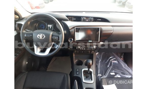 Buy Import Toyota Hilux Red Car in Import - Dubai in Al Jazirah State Buy Import Toyota Hilux Red Car in Import - Dubai in Al Jazirah State