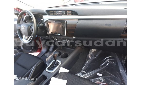 Buy Import Toyota Hilux Red Car in Import - Dubai in Al Jazirah State Buy Import Toyota Hilux Red Car in Import - Dubai in Al Jazirah State