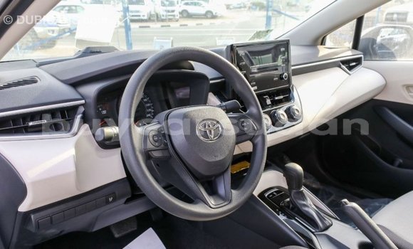 Buy Import Toyota Corolla White Car in Import - Dubai in Al Jazirah State Buy Import Toyota Corolla White Car in Import - Dubai in Al Jazirah State