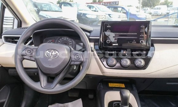 Buy Import Toyota Corolla White Car in Import - Dubai in Al Jazirah State Buy Import Toyota Corolla White Car in Import - Dubai in Al Jazirah State