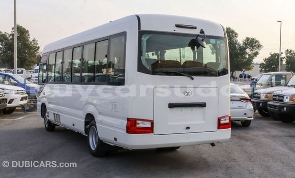 Buy Import Toyota Coaster White Car in Import - Dubai in Al Jazirah State Buy Import Toyota Coaster White Car in Import - Dubai in Al Jazirah State