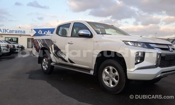 Buy Import Mitsubishi L200 White Car in Import - Dubai in Al Jazirah State Buy Import Mitsubishi L200 White Car in Import - Dubai in Al Jazirah State