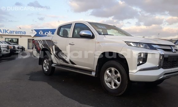 Buy Import Mitsubishi L200 White Car in Import - Dubai in Al Jazirah State Buy Import Mitsubishi L200 White Car in Import - Dubai in Al Jazirah State
