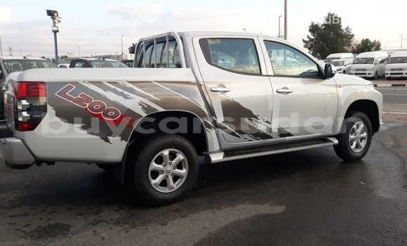 Buy Import Mitsubishi L200 White Car in Import - Dubai in Al Jazirah State Buy Import Mitsubishi L200 White Car in Import - Dubai in Al Jazirah State
