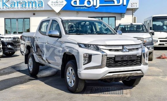 Buy Import Mitsubishi L200 White Car in Import - Dubai in Al Jazirah State Buy Import Mitsubishi L200 White Car in Import - Dubai in Al Jazirah State