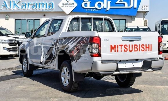 Buy Import Mitsubishi L200 White Car in Import - Dubai in Al Jazirah State Buy Import Mitsubishi L200 White Car in Import - Dubai in Al Jazirah State
