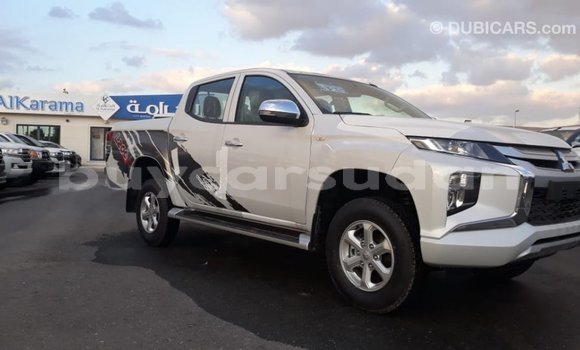 Buy Import Mitsubishi L200 White Car in Import - Dubai in Al Jazirah State Buy Import Mitsubishi L200 White Car in Import - Dubai in Al Jazirah State