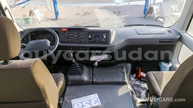 Big with watermark toyota coaster al jazirah state import dubai 2903