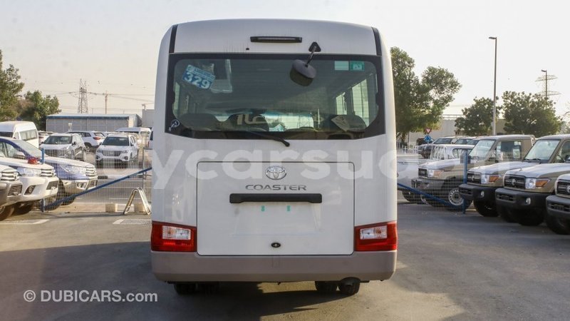 Big with watermark toyota coaster al jazirah state import dubai 2903