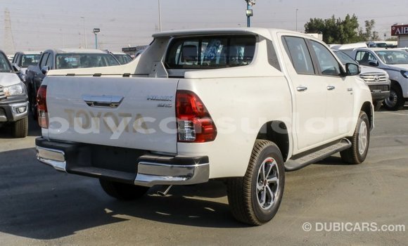 Buy Import Toyota Hilux White Car in Import - Dubai in Al Jazirah State Buy Import Toyota Hilux White Car in Import - Dubai in Al Jazirah State