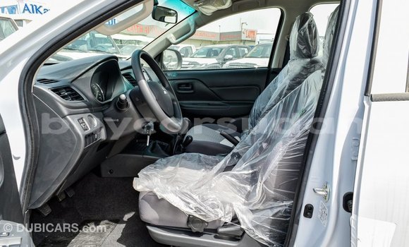 Buy Import Mitsubishi L200 White Car in Import - Dubai in Al Jazirah State Buy Import Mitsubishi L200 White Car in Import - Dubai in Al Jazirah State