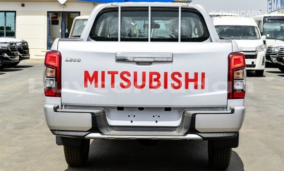 Buy Import Mitsubishi L200 White Car in Import - Dubai in Al Jazirah State Buy Import Mitsubishi L200 White Car in Import - Dubai in Al Jazirah State