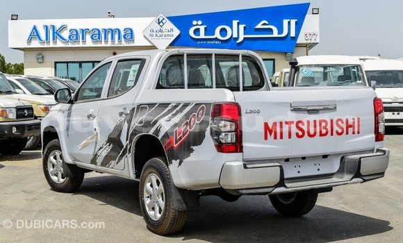 Buy Import Mitsubishi L200 White Car in Import - Dubai in Al Jazirah State Buy Import Mitsubishi L200 White Car in Import - Dubai in Al Jazirah State