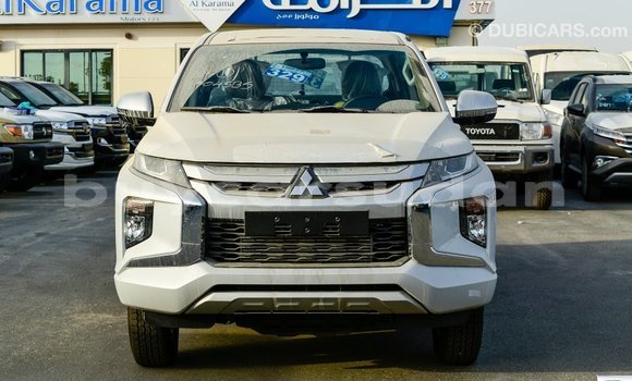 Buy Import Mitsubishi L200 White Car in Import - Dubai in Al Jazirah State Buy Import Mitsubishi L200 White Car in Import - Dubai in Al Jazirah State