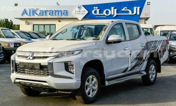 Buy Import Mitsubishi L200 White Car in Import - Dubai in Al Jazirah State Buy Import Mitsubishi L200 White Car in Import - Dubai in Al Jazirah State