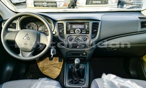 Buy Import Mitsubishi L200 White Car in Import - Dubai in Al Jazirah State Buy Import Mitsubishi L200 White Car in Import - Dubai in Al Jazirah State