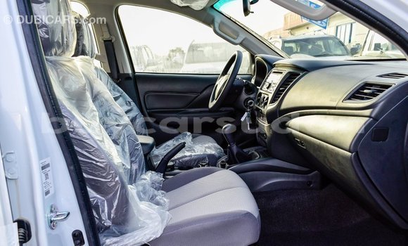 Buy Import Mitsubishi L200 White Car in Import - Dubai in Al Jazirah State Buy Import Mitsubishi L200 White Car in Import - Dubai in Al Jazirah State
