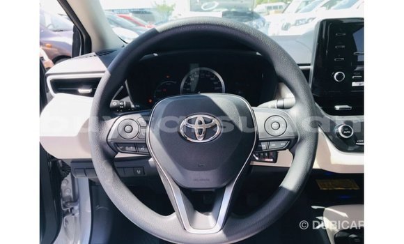 Buy Import Toyota Corolla White Car in Import - Dubai in Al Jazirah State Buy Import Toyota Corolla White Car in Import - Dubai in Al Jazirah State