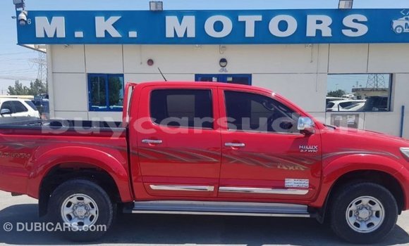 Buy Import Toyota Hilux Red Car in Import - Dubai in Al Jazirah State Buy Import Toyota Hilux Red Car in Import - Dubai in Al Jazirah State