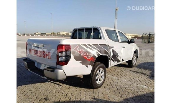 Buy Import Mitsubishi L200 White Car in Import - Dubai in Al Jazirah State Buy Import Mitsubishi L200 White Car in Import - Dubai in Al Jazirah State
