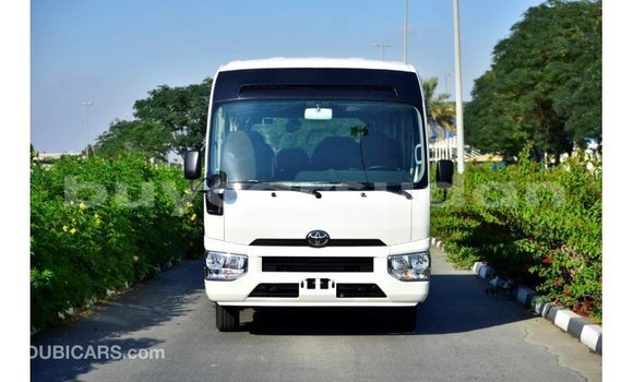 Acheter Import Voiture Toyota Coaster Blanc à Import - Dubai, État d'Al Jazirah Acheter Import Voiture Toyota Coaster Blanc à Import - Dubai, État d'Al Jazirah
