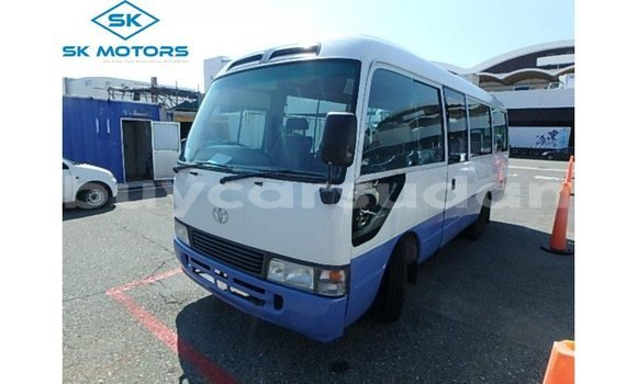 Buy Import Toyota Coaster White Car in Import - Dubai in Al Jazirah State